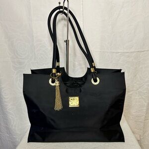 GIVENCHY PARFUMS Elegant Black Nylon Tote Bag with Gold Accents.